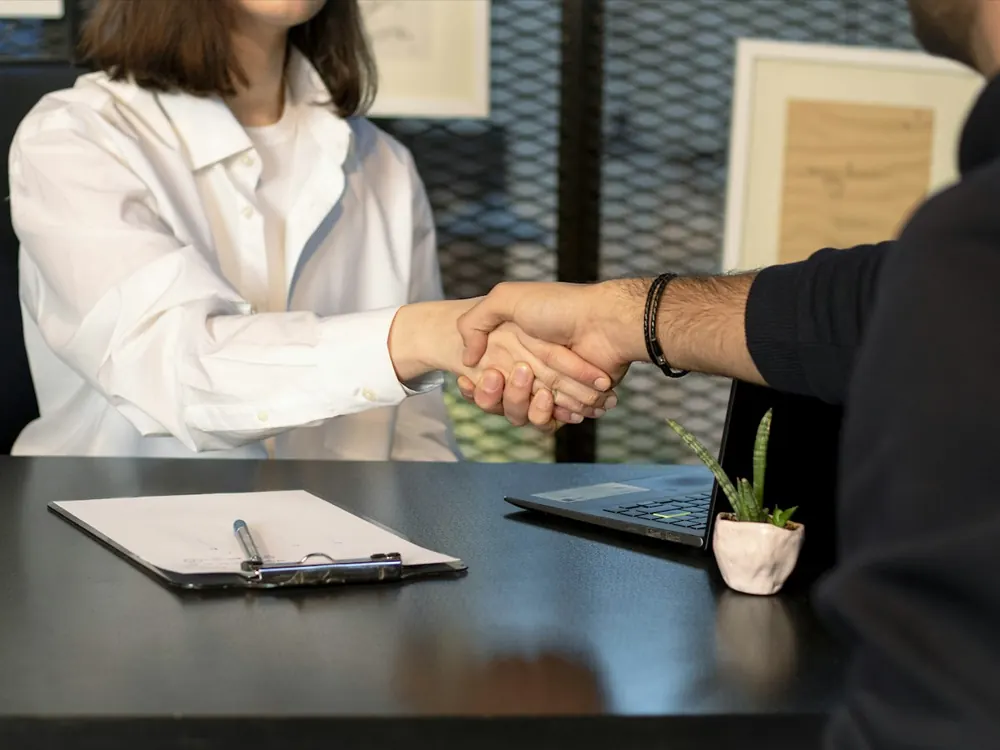 Two business partners shaking hands